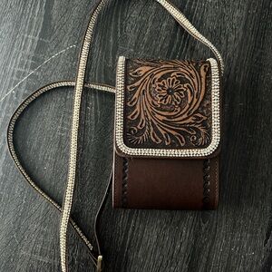 Brown and Silver Crossbody Bag with Intricate Design